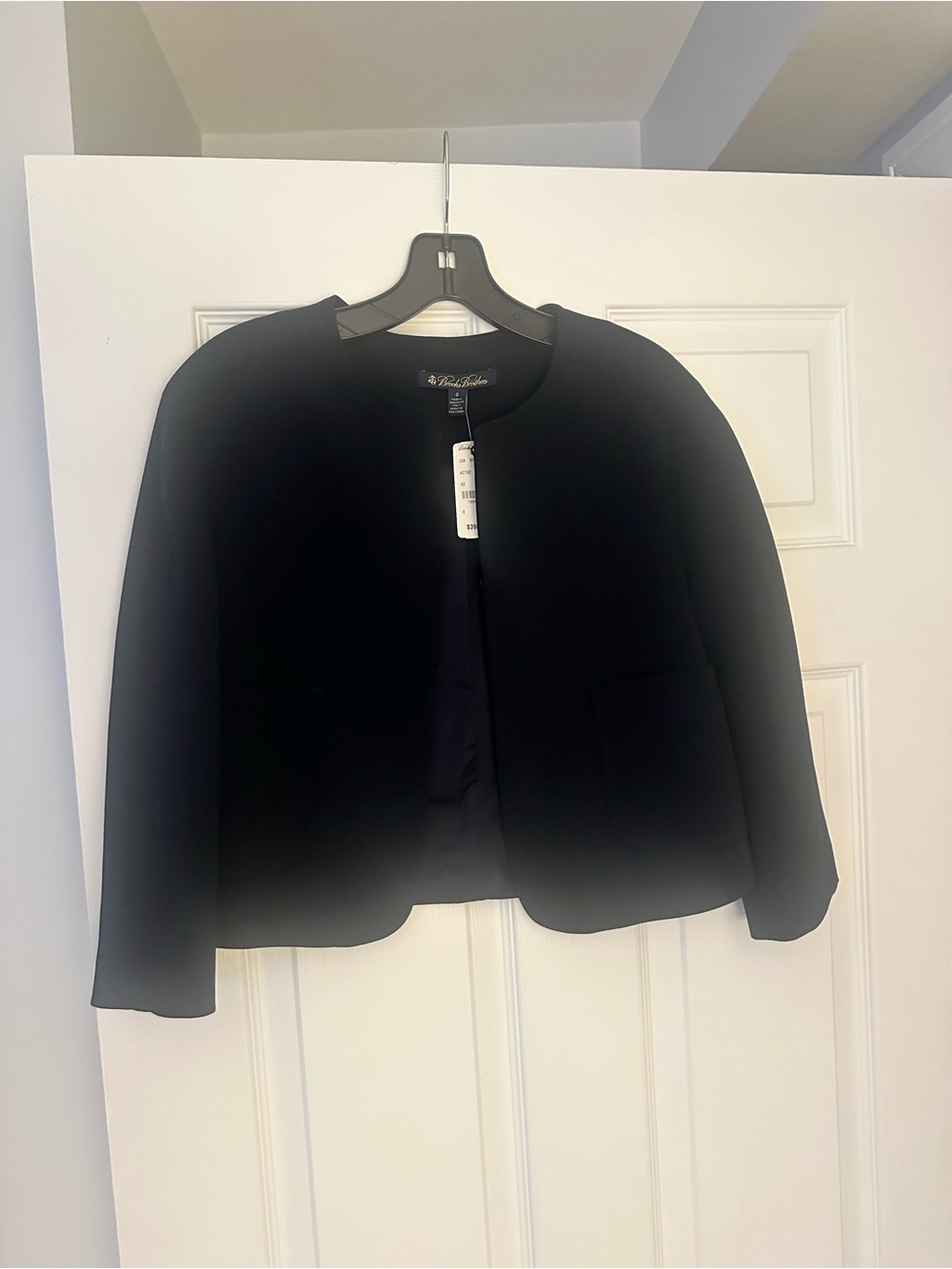 Original price: $398. Tags attached, never worn. Black, cropped jacket.